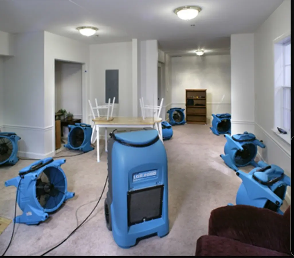 Air movers and dehumidifier setup for Water Damage Restoration in Fitchburg